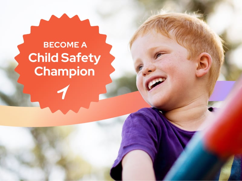 Smiling boy, badge that says "Become a Child Safety Champion"